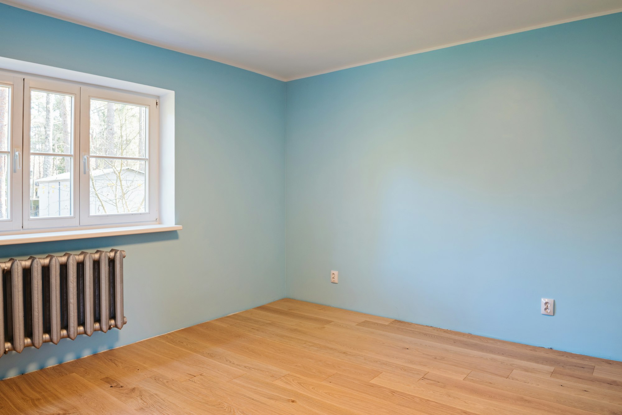 New home construction interior room with wooden floors
